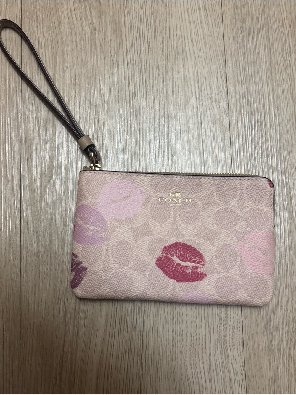 COACH Pink Kiss-Print Signature Wristlet